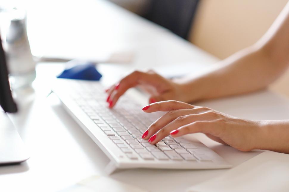 Free Image of Hands on a keyboard 