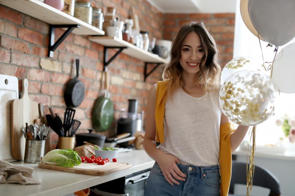 Free Image of Woman with balloons 