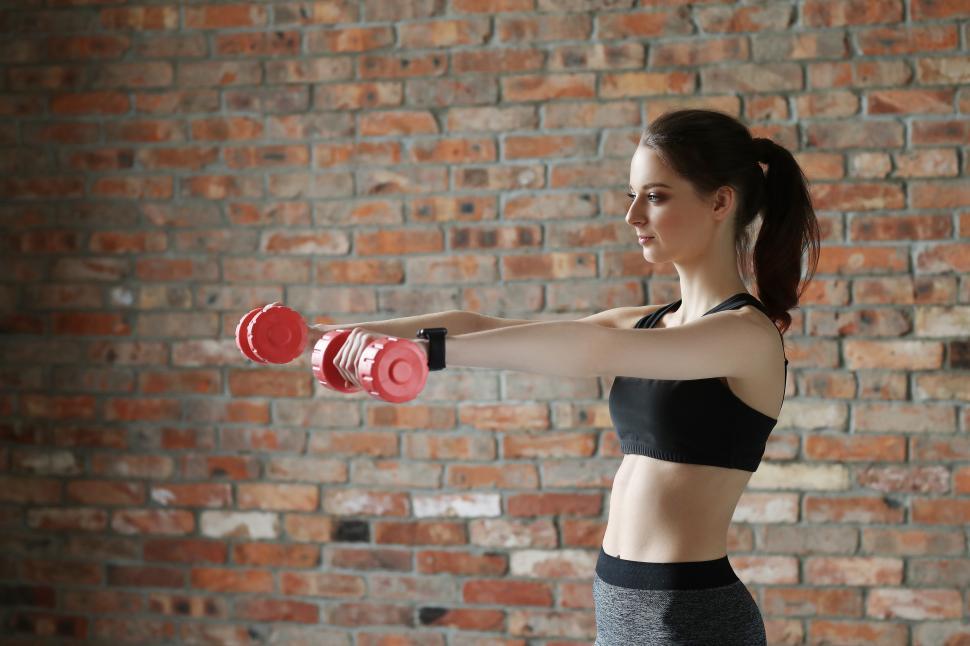 Free Image of Workout with hand weights 