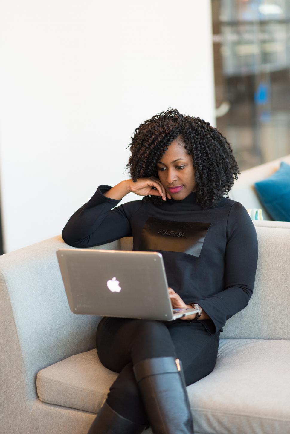 Free Image of Businesswoman in casual clothing with laptop 