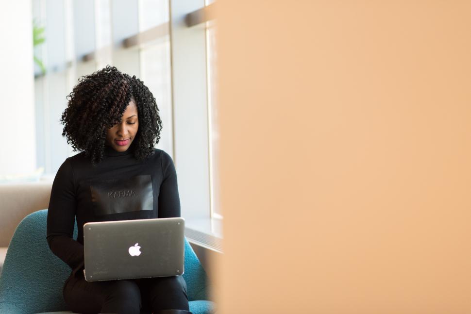 Free Image of Businesswoman in casual clothing working on laptop 