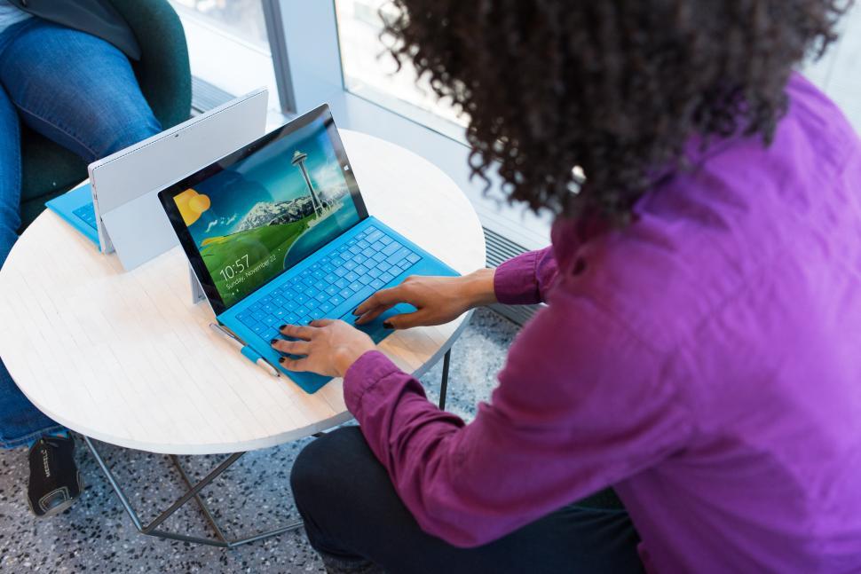 Free Image of Female executive typing with tablet computer keyboard in office 
