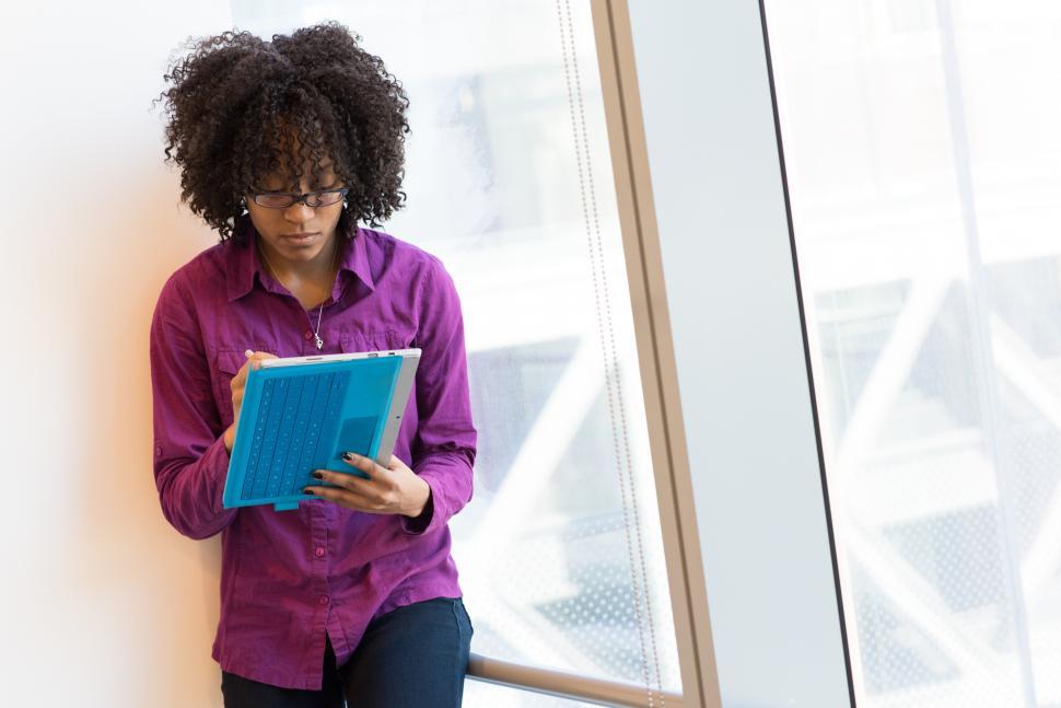 Free Image of Female executive in glasses with tablet computer in office 