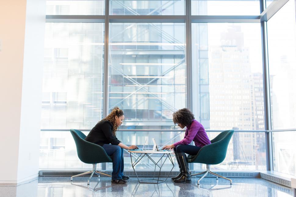 Free Image of Female co-workers using tablet device 