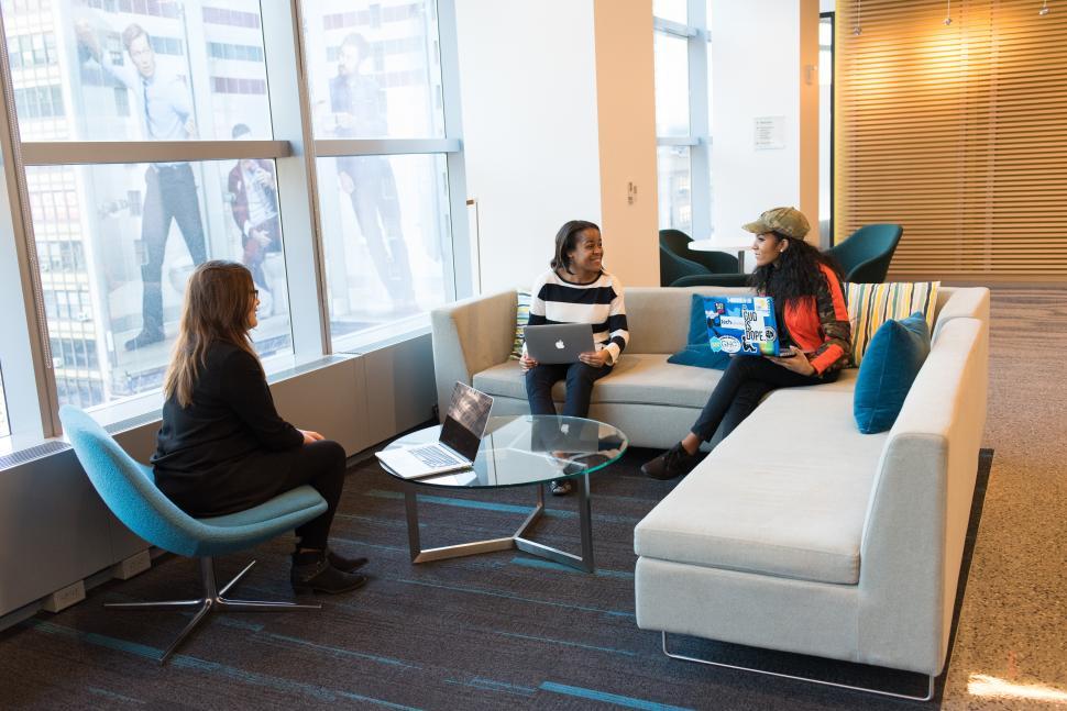 Free Image of Happy businesswomen talking to each other 