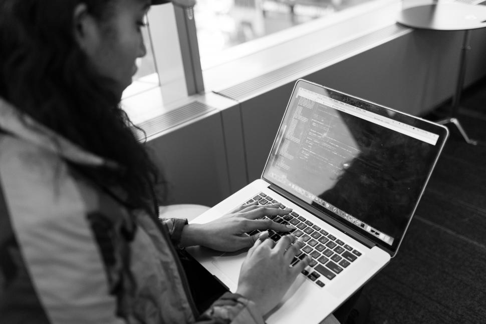 Free Image of Woman typing on laptop 