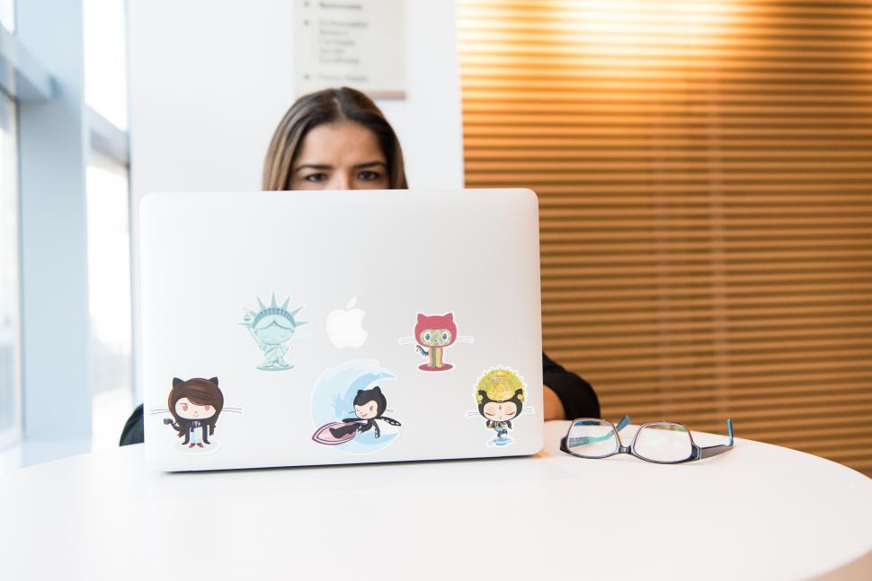 Free Image of Businesswoman working on laptop in office 