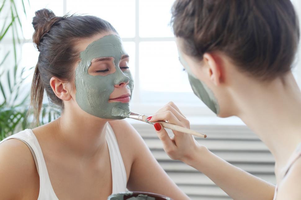 Free Image of Applying facial mask 