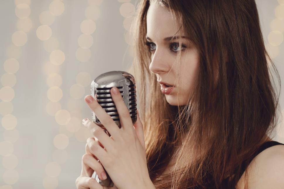 Free Image of Woman at the microphone 