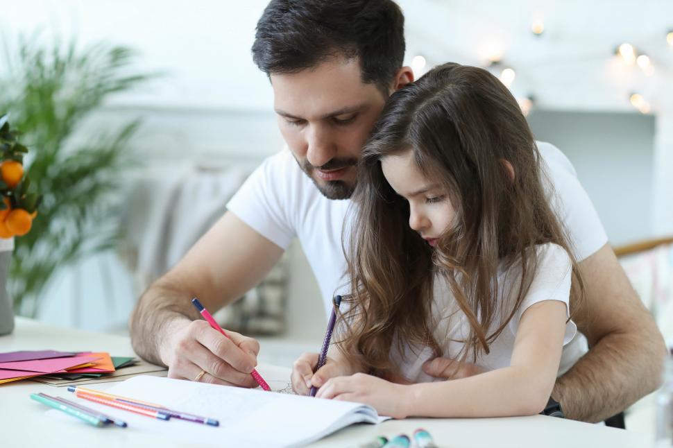 Free Image of Man and child drawing 