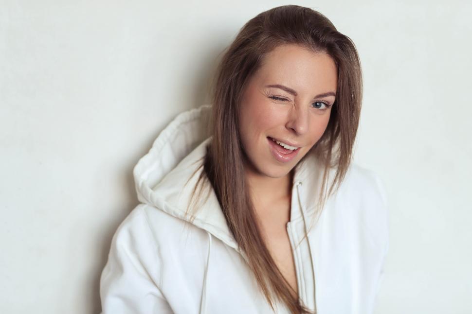 Free Image of Woman winking 