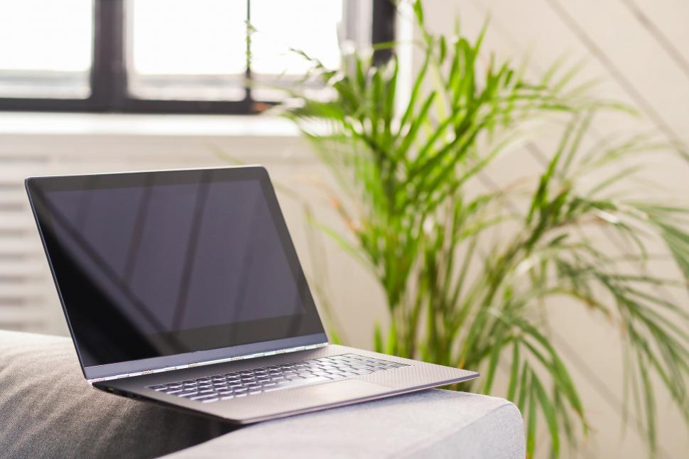 Free Image of Laptop open in an apartment 