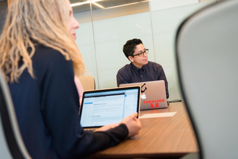 Free Image of LIstening to a presentation 
