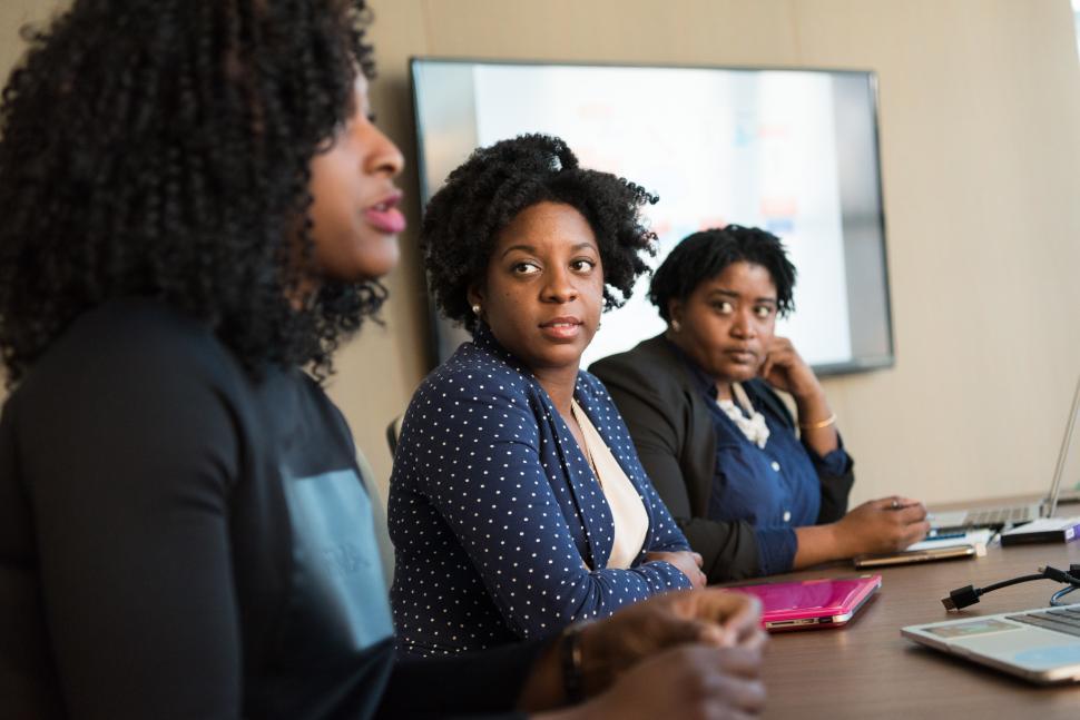 Free Image of Businesswomen working together in meeting room 