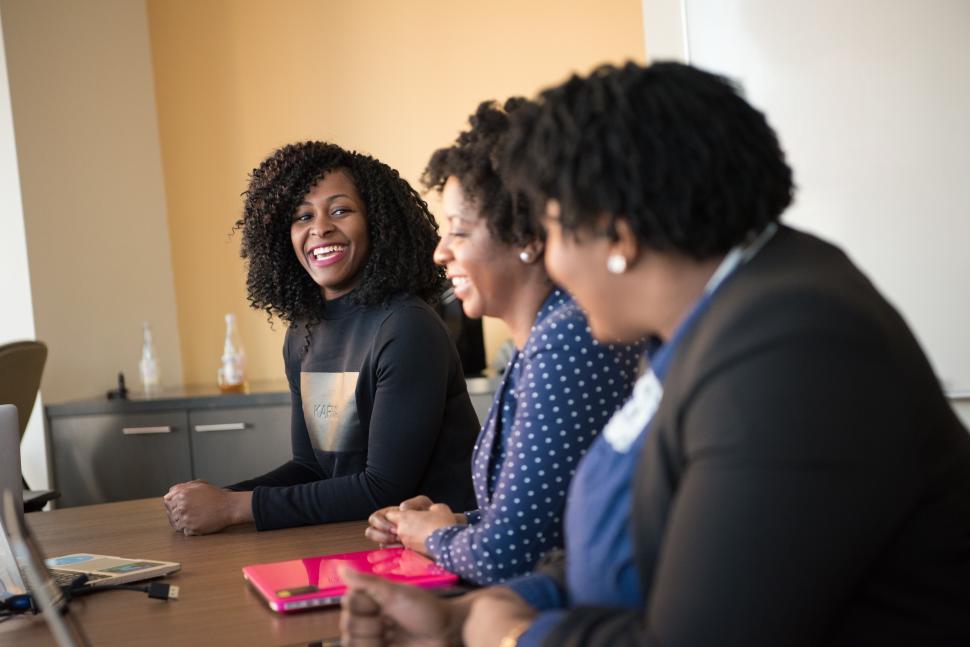 Free Image of Group of Businesswomen working together in meeting room 