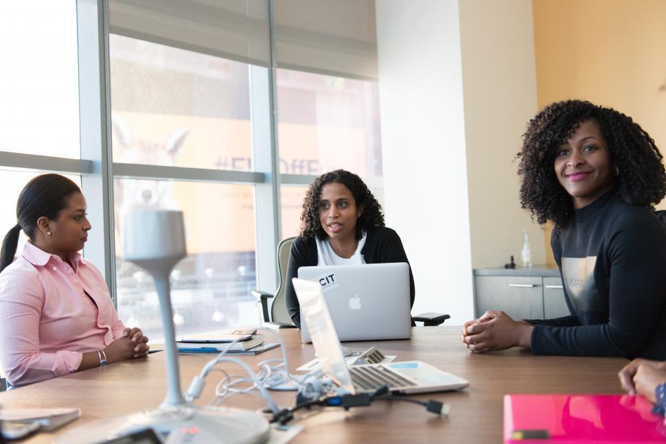 Free Image of Businesswomen discussing with laptop in a meeting room 