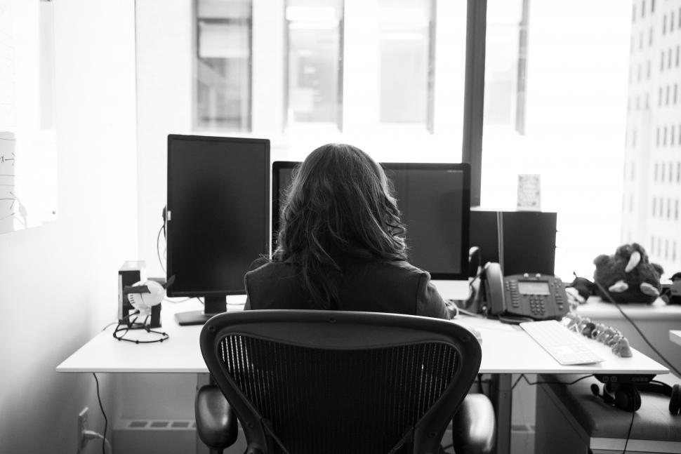 Free Image of Female executive with computer at the desk 
