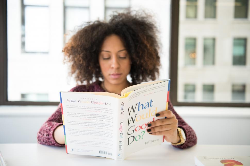 Free Image of Female developer with book 