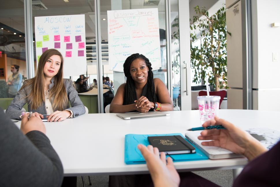 Free Image of Businesswomen discussing a plan in meeting room 