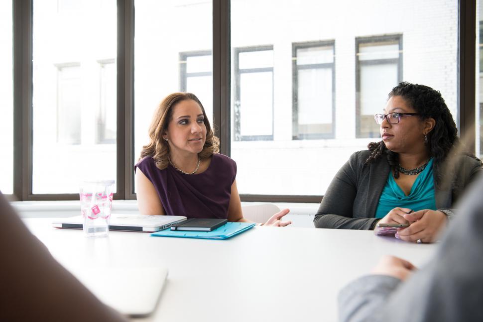 Free Image of Businesswomen discussing a plan in meeting room 
