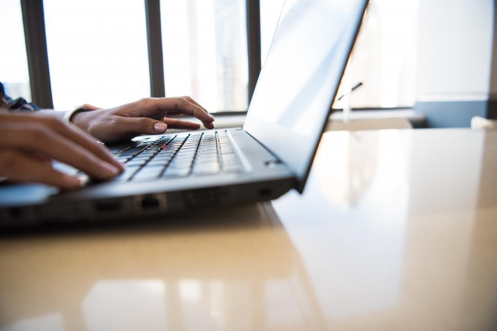 Free Image of Hands typing on laptop 