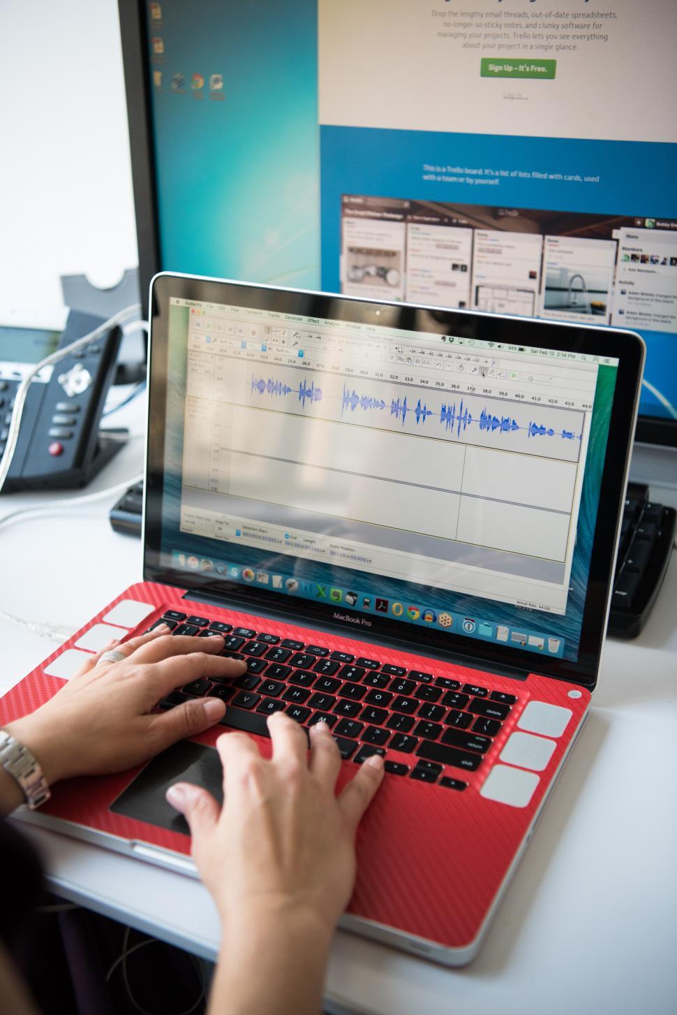Free Image of Hands typing on laptop keyboard 
