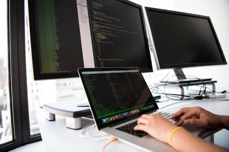 Free Image of Female web developer with laptop 