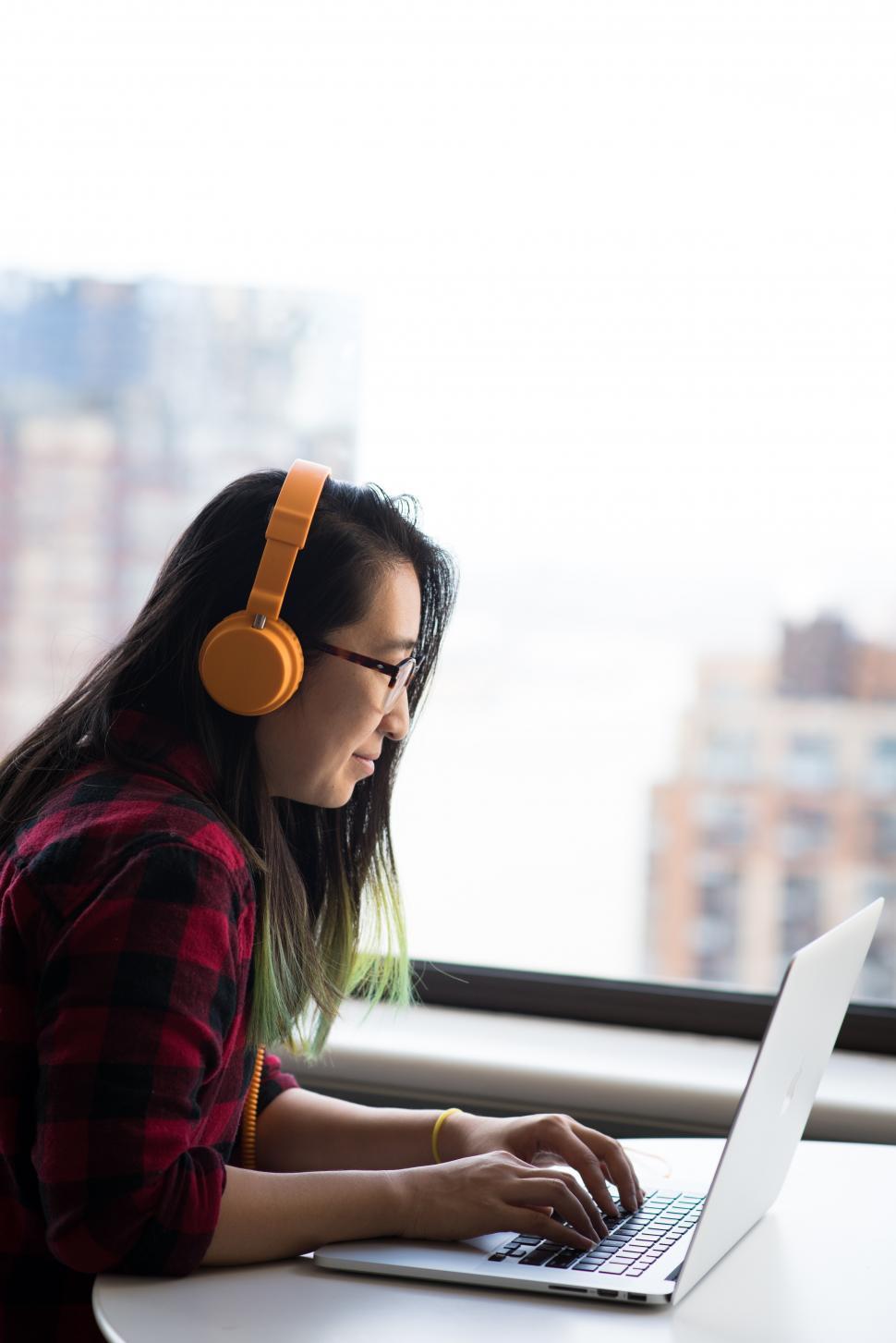 Free Image of Female executive working on laptop 