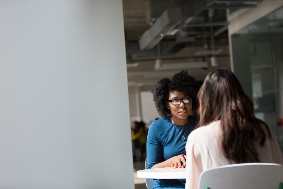 Free Image of Two business women having a conversation 