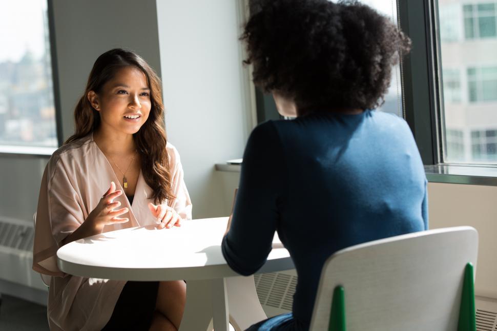 Free Image of Two business women having a conversation 