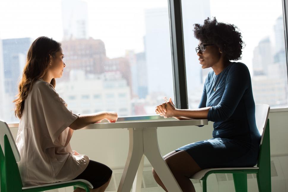 Free Image of Two business women having a conversation 