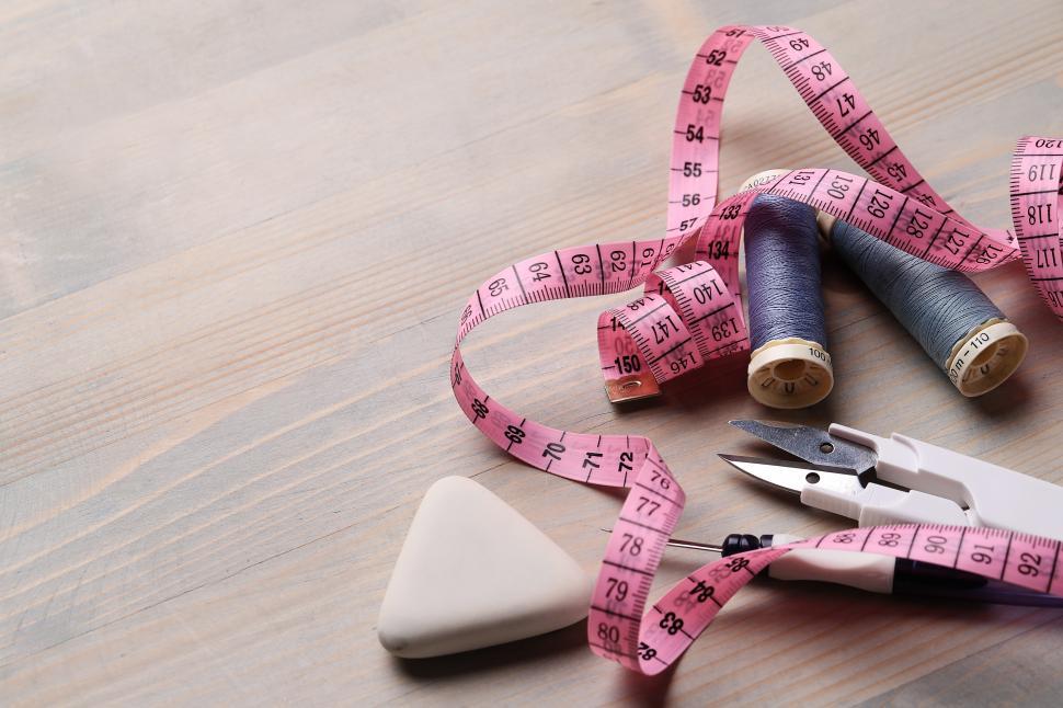 Free Image of Sewing tools on worktable 