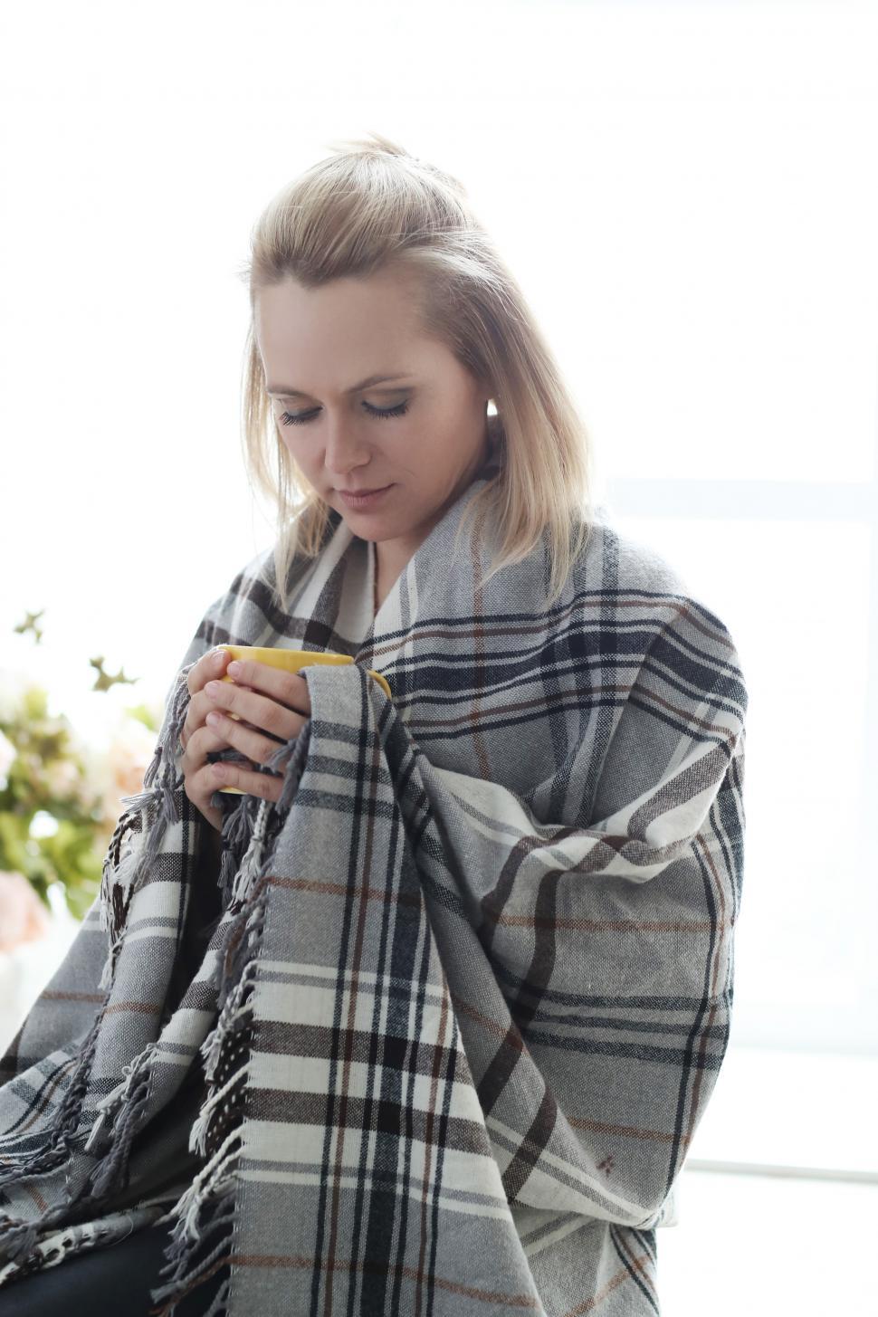 Free Image of Woman wrapped in blanket 