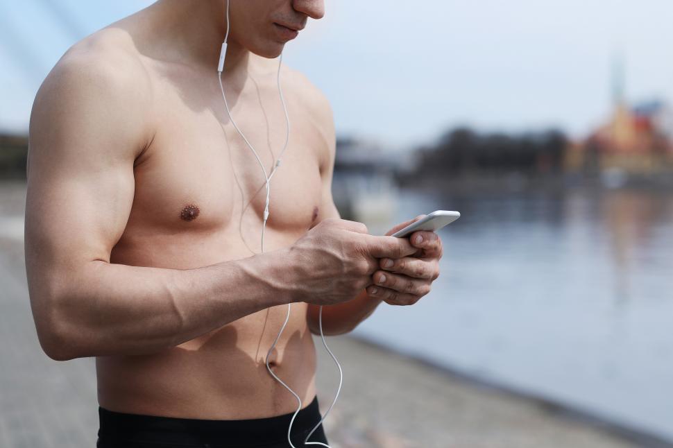 Free Image of Fit shirtless man outdoors 