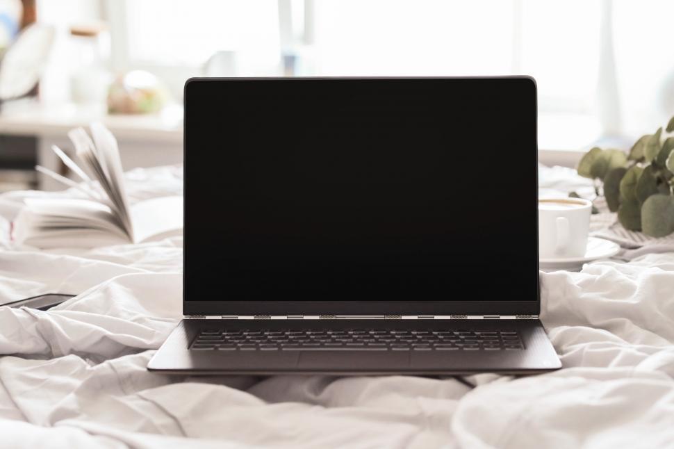 Free Image of Laptop open, facing viewer, blank screen 