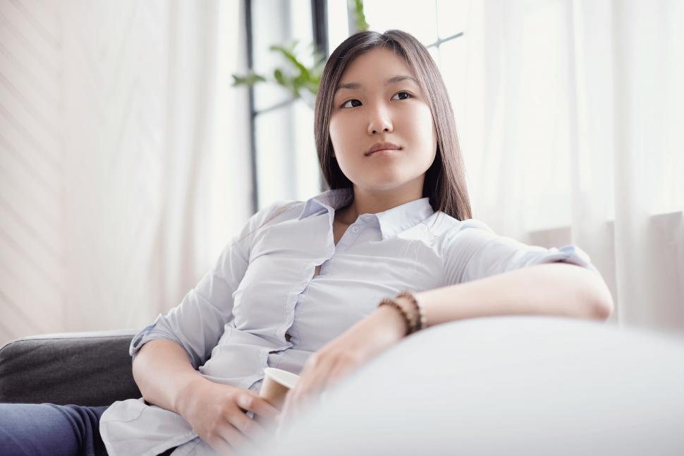 Free Image of Woman looking thoughtful 