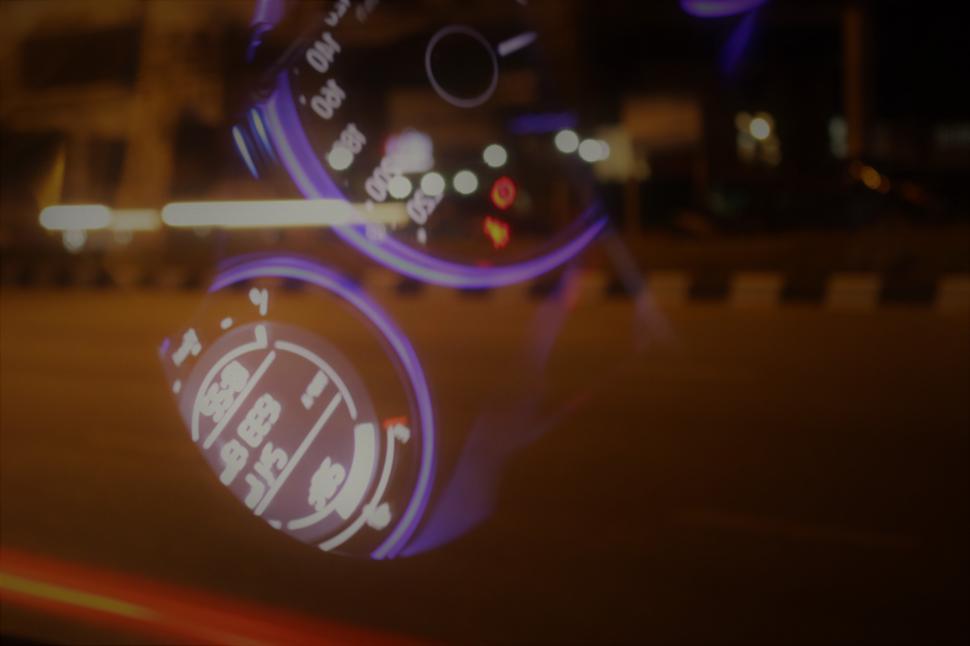 Free Image of Night driving dash lights reflection  