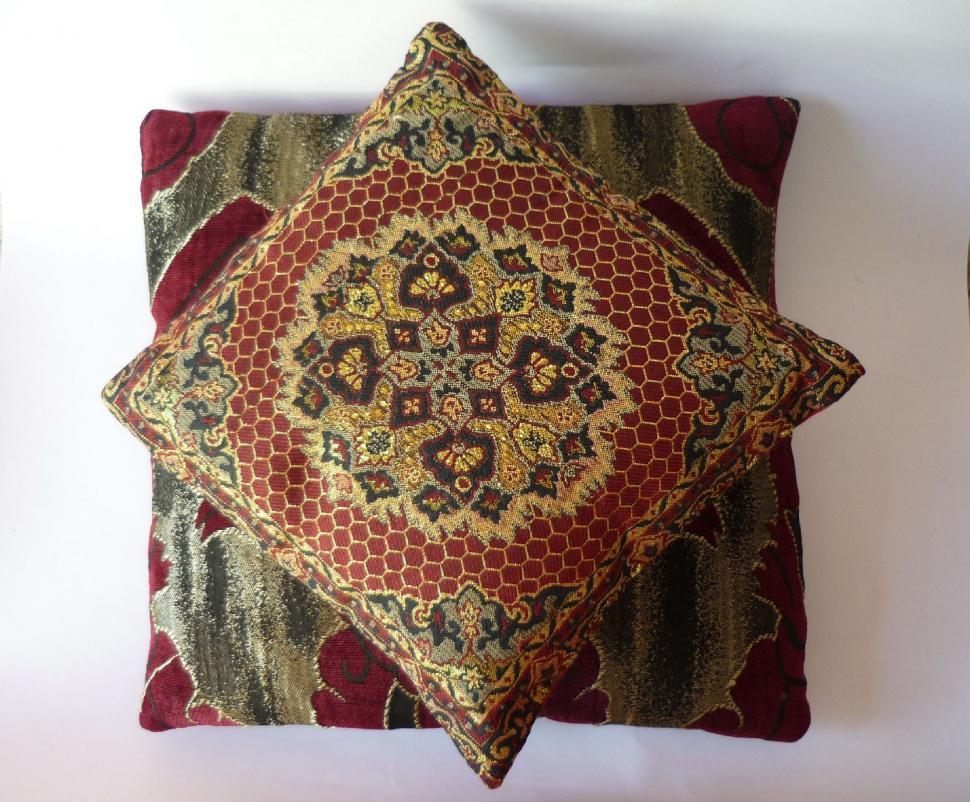 Free Image of Decorative Pillow on White Wall 