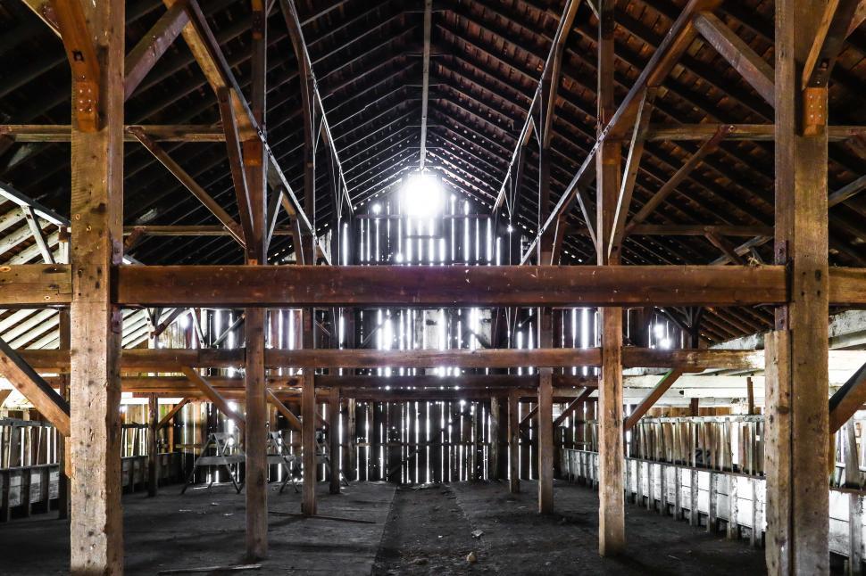 Free Image of Sun shines into an old barn 