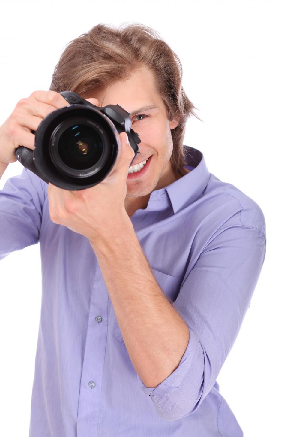 Free Image of Young photographer taking a photo 