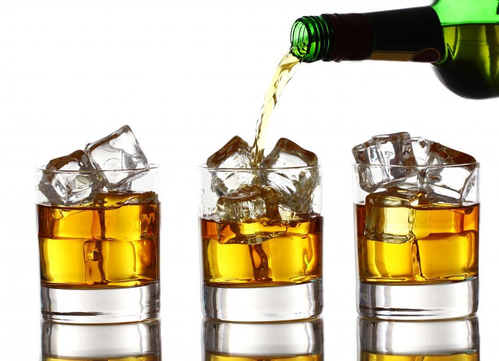 Free Image of Pouring the whiskey 