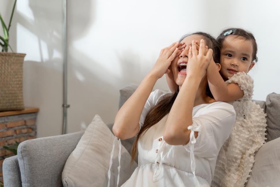 Free Image of Mother and her daughter playing 
