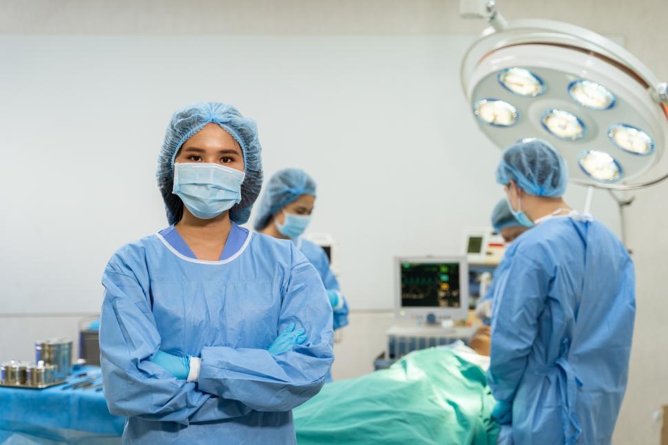 Free Image of Woman and Surgical Team 