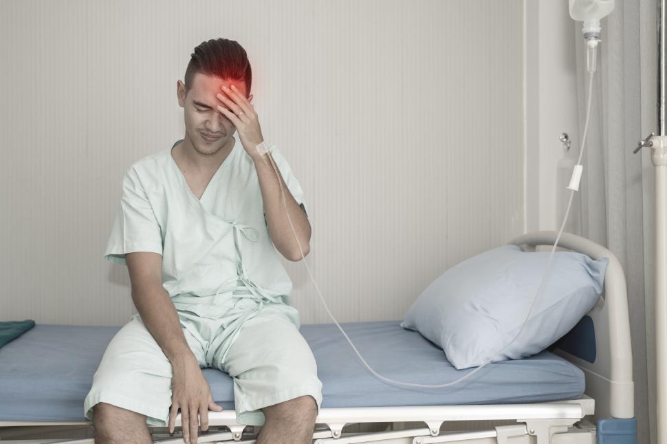 Free Image of Young man with a headache 