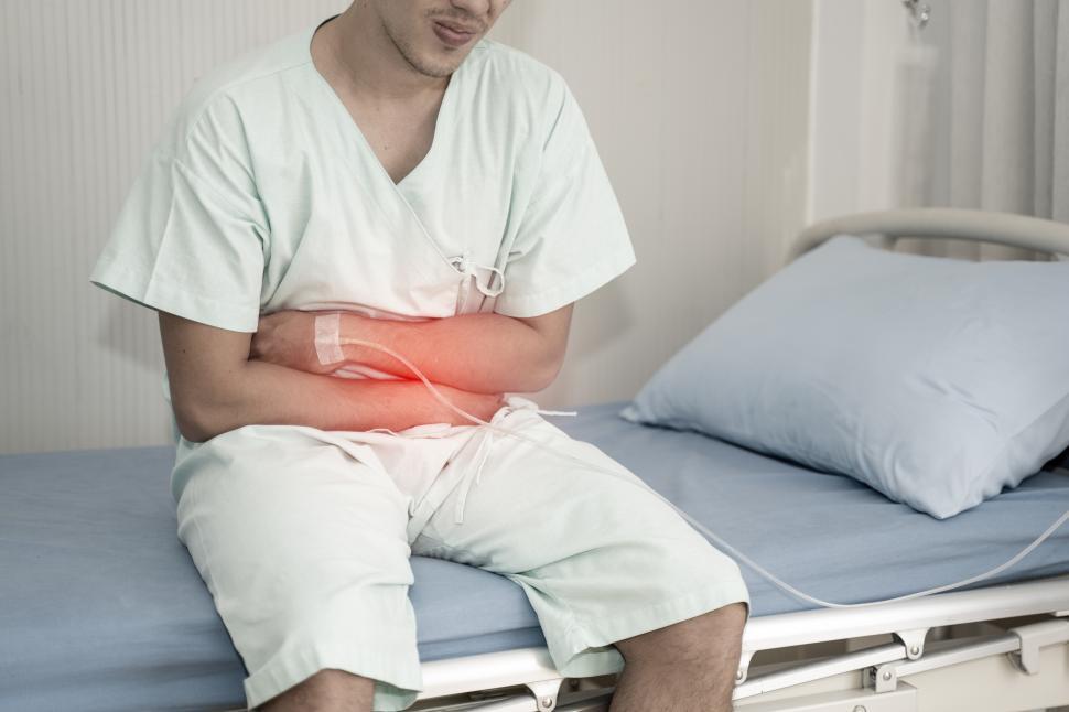 Free Image of Man with a stomach ache 