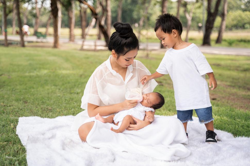Free Image of Young mother feeding her newborn 