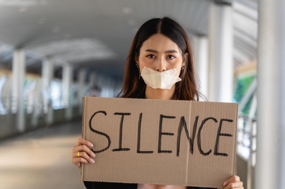 Free Image of Asian woman activist with sign protesting for equality 