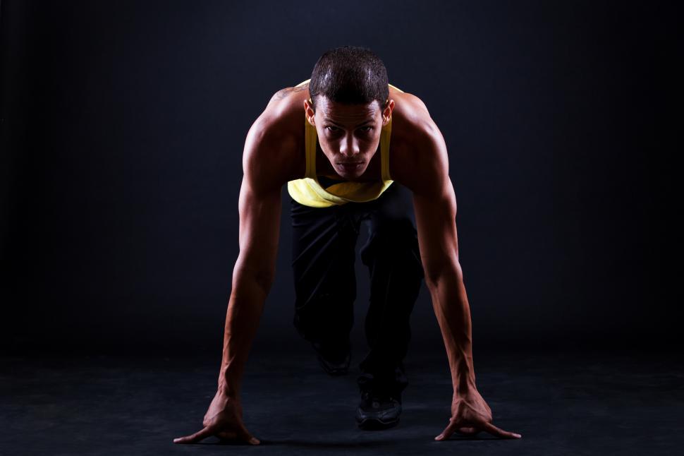 Free Image of Young muscular man is ready for run 