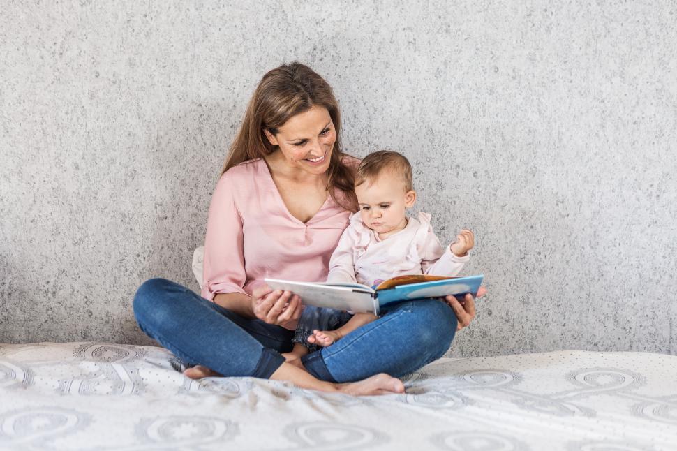 Free Image of Mother reading story to her daughter 