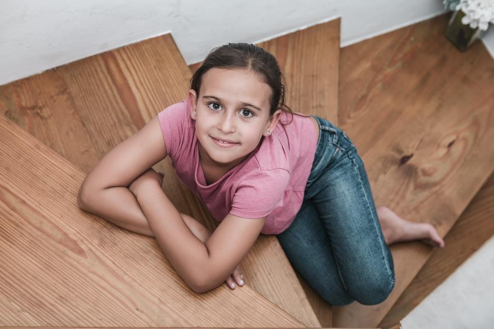 Free Image of Girl sitting on the stairs 